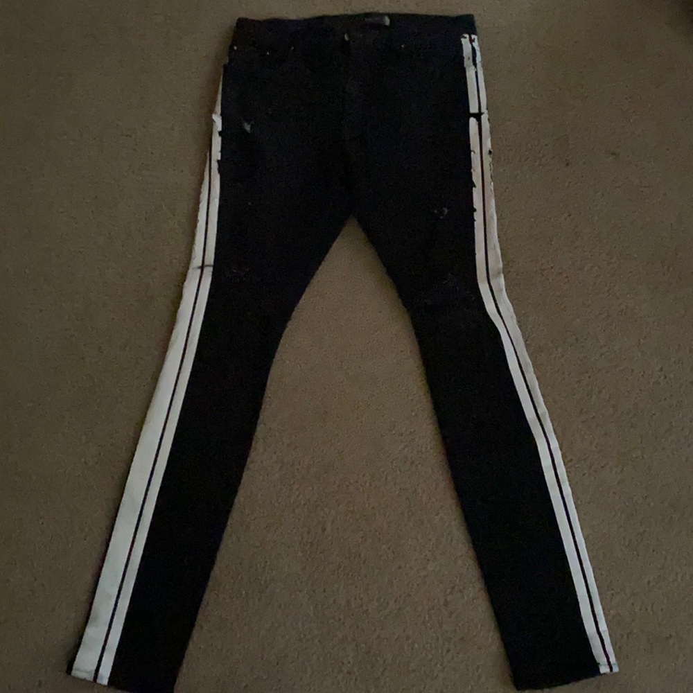 Amiri jeans with white stripes